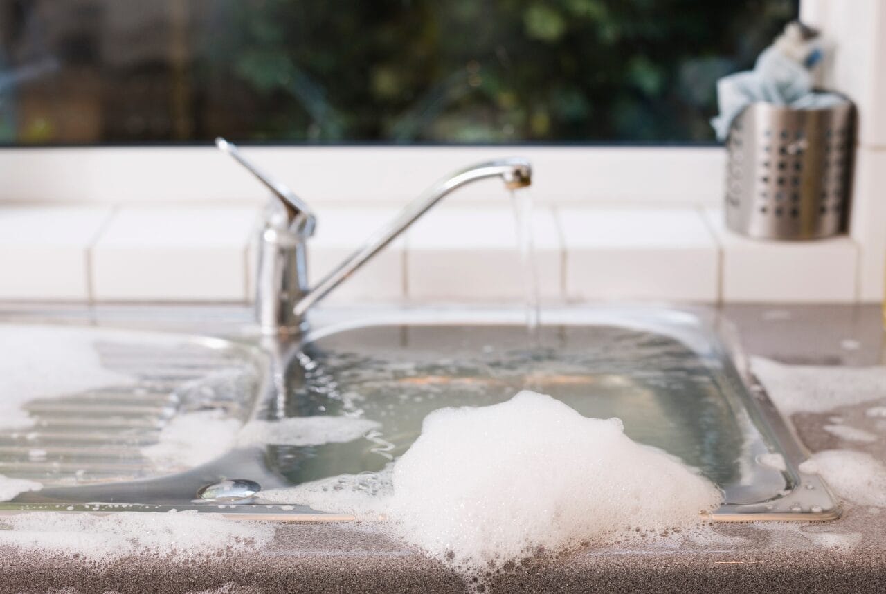water overflowing sink causes of clogged drains